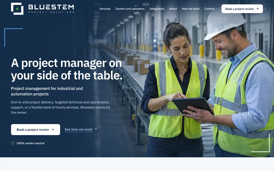 The home page of the preview site: a project manager and an operations lead review a tablet on a warehouse floor, under the headline A project manager on your side of the table.